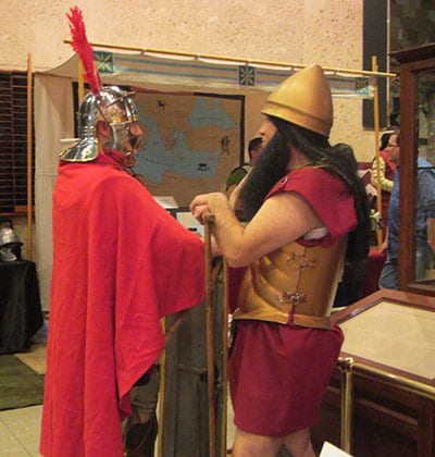Greek and Roman soldiers chat